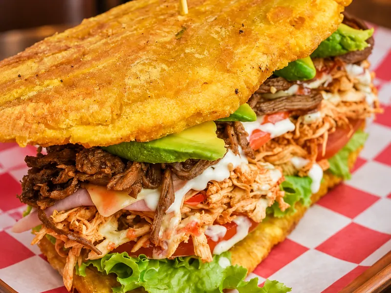 Patacón — Fried green plantain sandwich