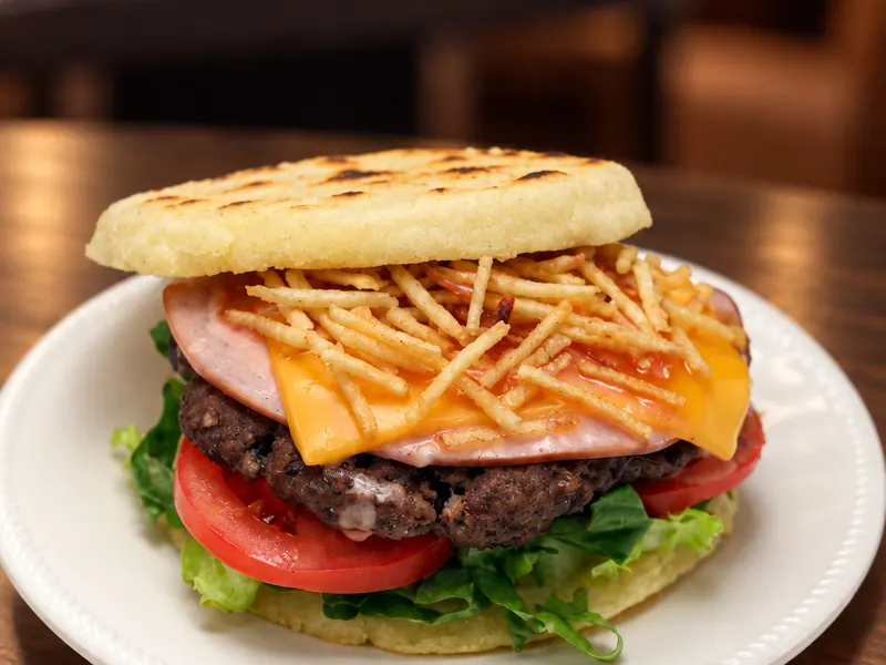 Burger arepa — Burger served on an arepa